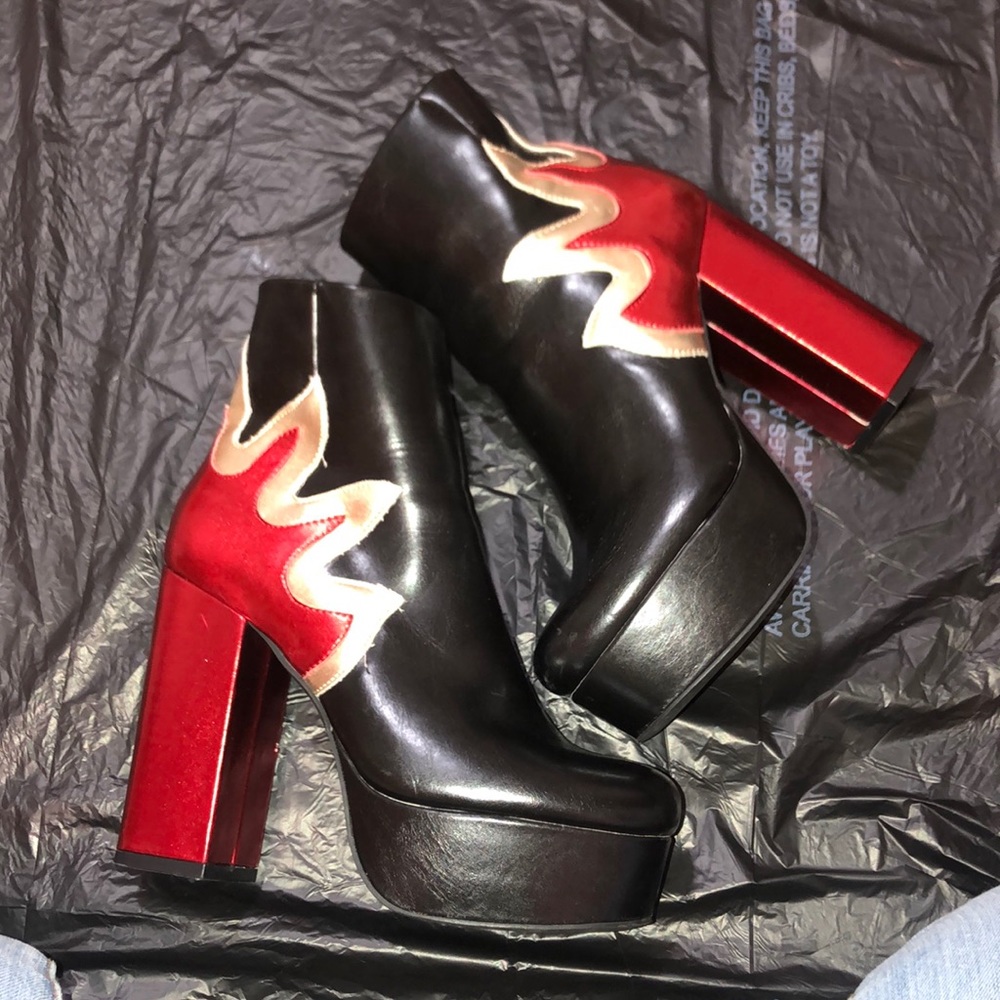 Gently used flame bootie